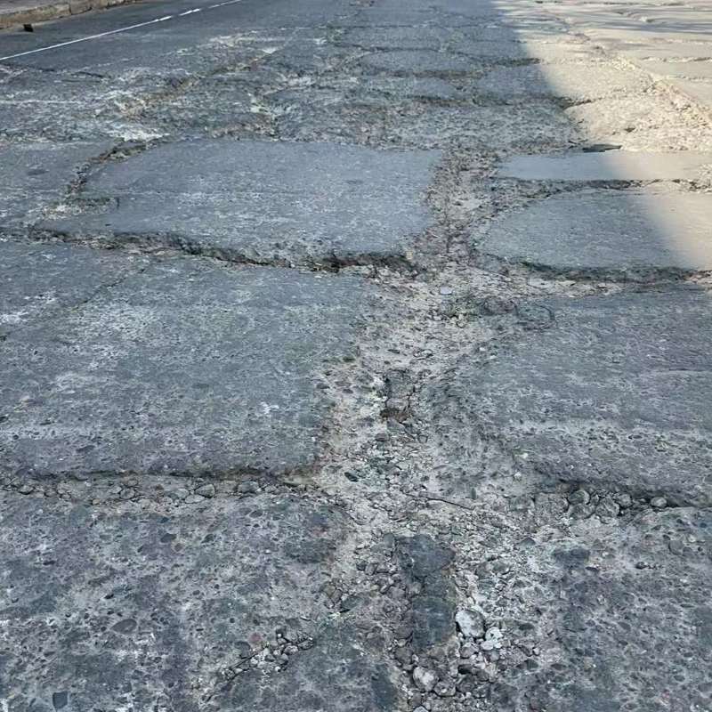 井冈山路面起砂露石子修补料